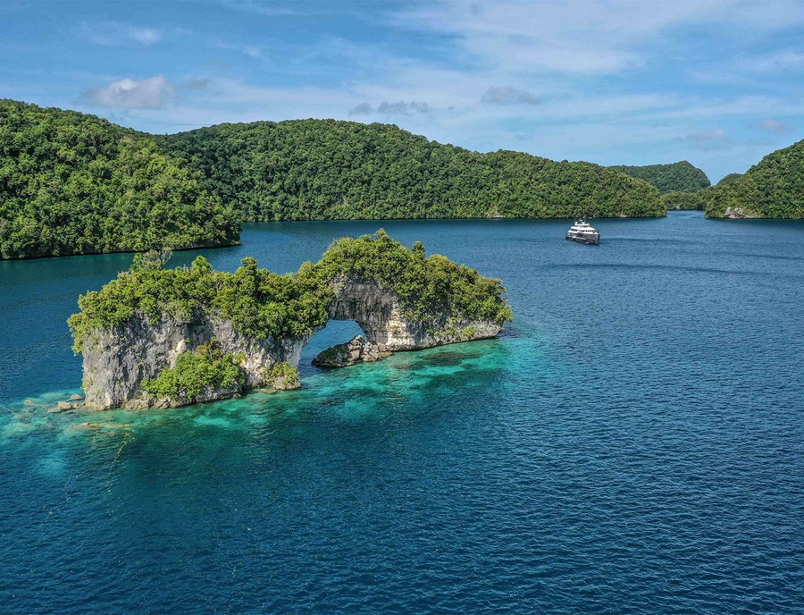 The Arch Showcases Palau’S Dramatic Limestone Formations And Clear Waters