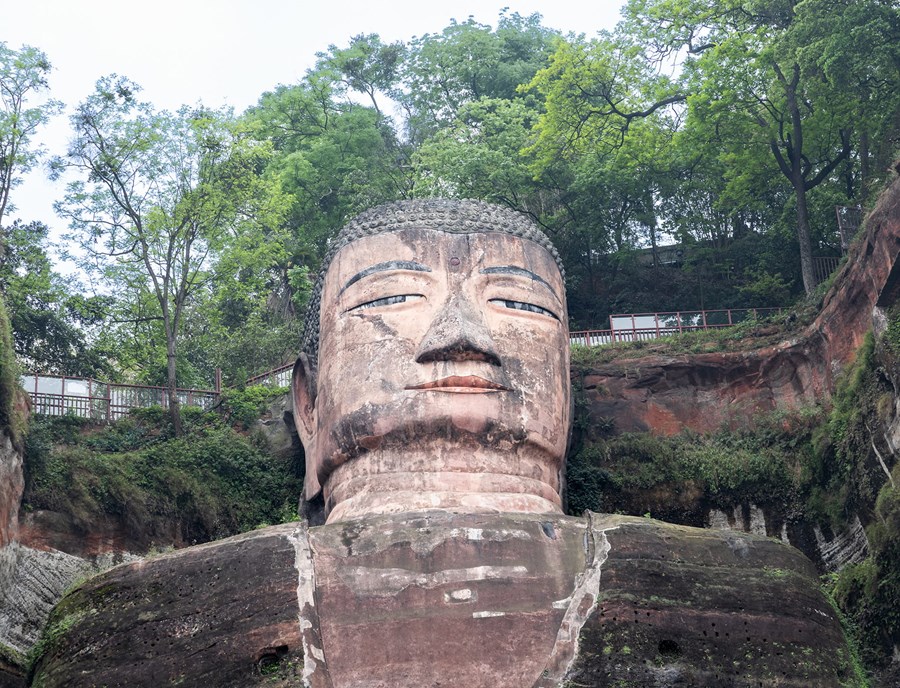 Standing Before The World's Largest Stone Buddha.