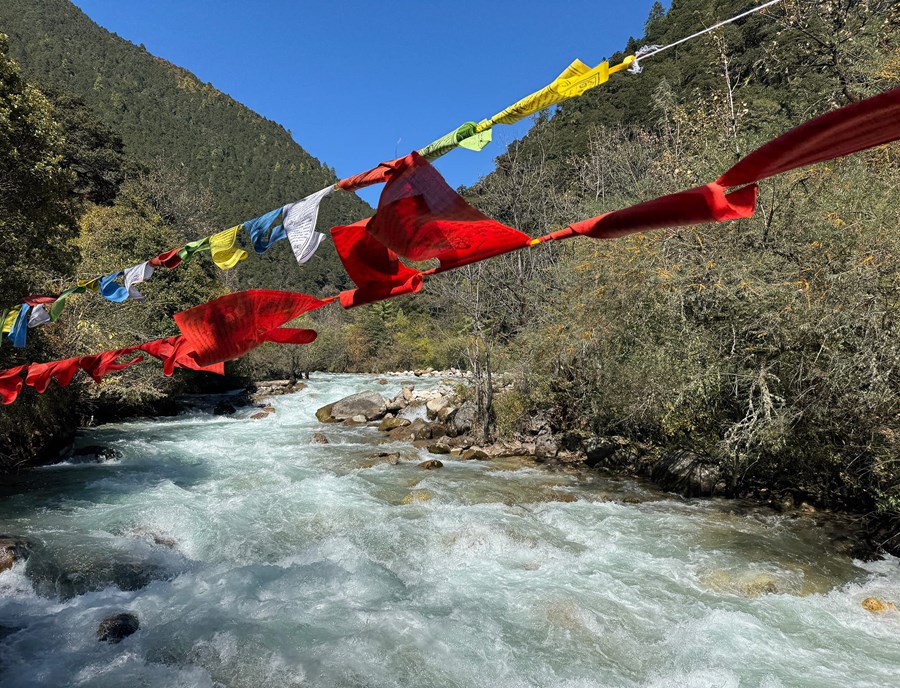 Soi Yaksa Blends Rushing Rivers With Colourful Prayer Flags