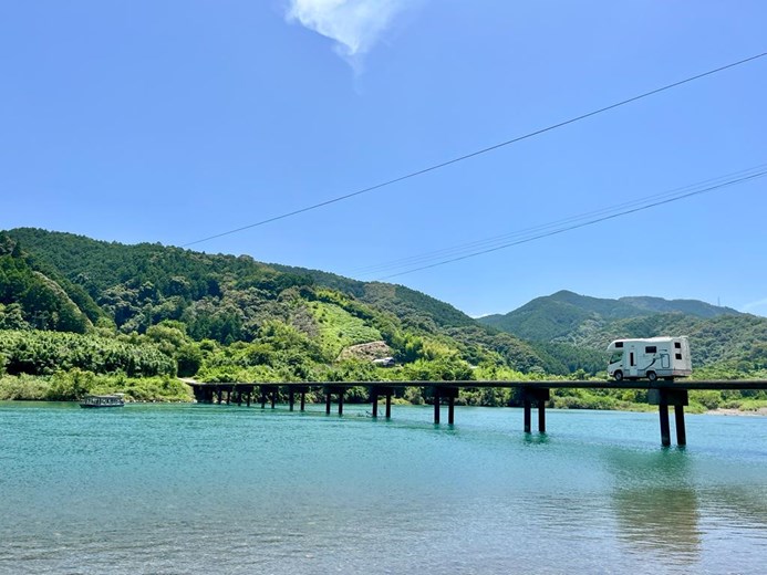 Campervan overlooking a beautiful lake view in Japan