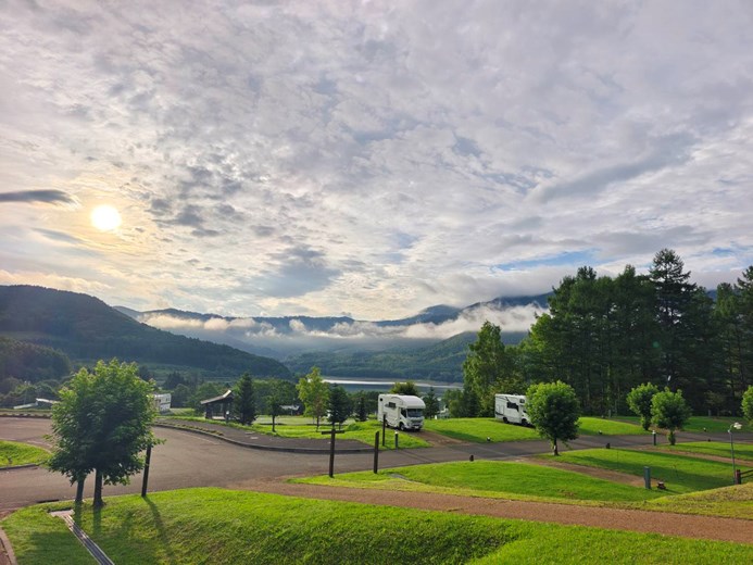Campervan in Japan with a breathtaking sunrise or sunset backdrop