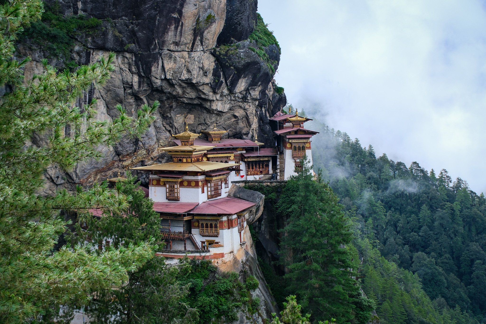 Tiger’s Nest Monastery stands above Paro Valley beneath changing mountain skies