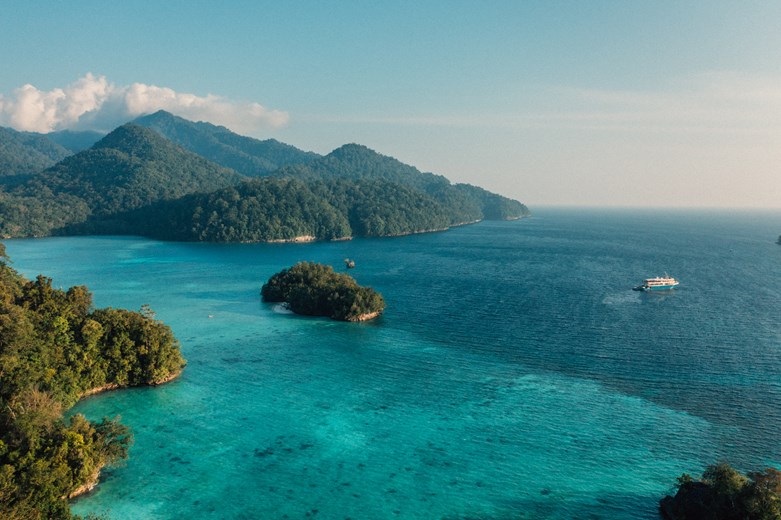 View of Misool’s iconic limestone cliffs and turquoise lagoons from the Kudanil Explorer.