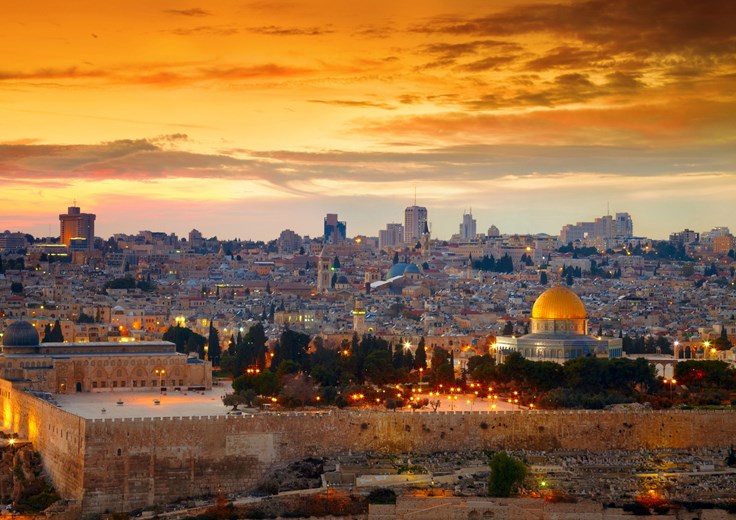 Golden hour over Jerusalem’s Old City, where history glows beneath a fiery sky