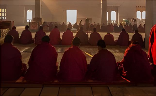 Monks participating in an evening prayer ceremony at the Shedra in Bhutan