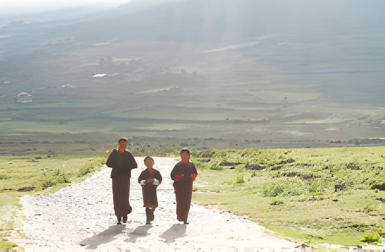 Locals enjoying a walk on the open Gangtey Nature Trail, with Bhutan’s natural scenery around them