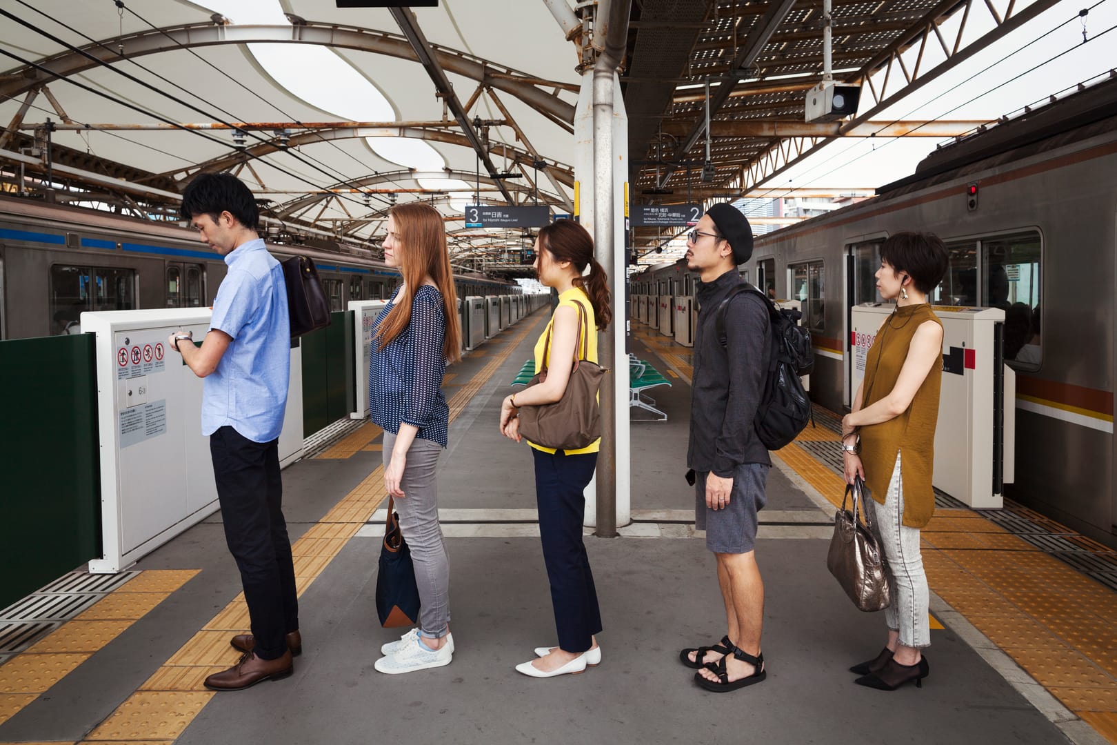 Japanese Train Queue Showing Calm And Considerate Travel